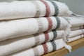 Shelves with towels stacks in shop. Hygge or another scandinavian style
