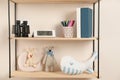 Shelves with toys and kids stuff in  room Royalty Free Stock Photo