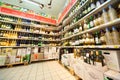 Shelves with wine in shop