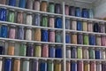 Shelving with glass jars of colorful pigments Royalty Free Stock Photo