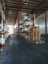 Shelving System With Boxes in Distribution Warehouse, Large industrial warehouse with high racks