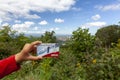 A Girl is holding an `America the beautiful` annual pass card