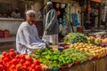 SHENDI, SUDAN - MARCH 6, 2019: Vegetables seller in Shendi, Sud Royalty Free Stock Photo