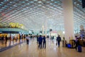 SHENZEN, CHINA - 29 JANUARY, 2017: Inside airport terminal connection halls, modern interior architecture design, glass