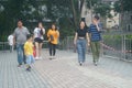 Shenzhen, China: In the afternoon, pedestrian landscapes on footbridges include off-duty men and women, workers, tourists and so o