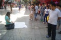 Shenzhen, China: begging woman
