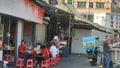 Shenzhen, China: breakfast shop landscape, people are eating noodles, etc.
