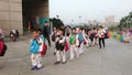 Shenzhen, China: children athletes walk past the sports square to take part in a competition Royalty Free Stock Photo