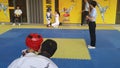 Shenzhen, China: children practicing taekwondo compete to test the effectiveness of their taekwondo lessons