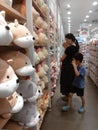 Shenzhen, China: Children`s toy goods in the famous and creative products store are purchased by parents with their children