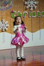 SHENZHEN, CHINA, 2011-12-23: Chinese child in flower costume per