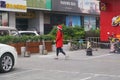 Shenzhen, China: Christmas, young women wearing Santa Claus costume