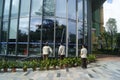 Shenzhen, China: cleaners in cleaning the glass Royalty Free Stock Photo