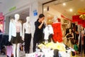 Shenzhen, China: clothing store discounted clothing, women are buying