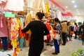 Shenzhen, China: clothing store discounted clothing, women are buying