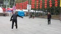 Shenzhen, China: elderly people play top as a fitness exercise in the morning sports square