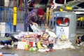 Shenzhen, China: Elderly woman picking up waste Royalty Free Stock Photo