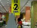 Shenzhen, China: Female shoppers shop for a 20 percent discount at a shopping mall