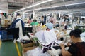 Shenzhen, China: garment factory workshop Royalty Free Stock Photo