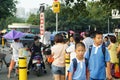 Shenzhen, China: the gate of the school gathered parents shuttle children