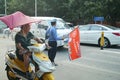 Shenzhen, China: the gate of the school gathered parents shuttle children