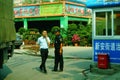 Shenzhen, China: male security guards on duty