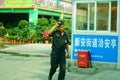 Shenzhen, China: male security guards on duty