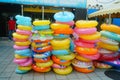 Shenzhen, China: many swimming rings are stacked at the door of stores for sale