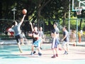 Shenzhen, China: men play basketball as a recreational sport.