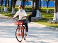 Shenzhen, China: men and women, children and other citizens or tourists relax in parks during the Spring Festival holiday