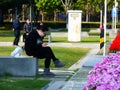 Shenzhen, China: men and women, children and other citizens or tourists relax in parks during the Spring Festival holiday