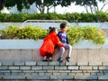 Shenzhen, China: men and women, children and other citizens or tourists relax in parks during the Spring Festival holiday