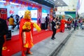 Shenzhen, China: mobile phone stores opened, Sun Wukong and young women dancing to attract customers