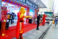 Shenzhen, China: mobile phone stores opened, Sun Wukong and young women dancing to attract customers