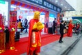 Shenzhen, China: mobile phone stores opened, Sun Wukong and young women dancing to attract customers