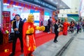 Shenzhen, China: mobile phone stores opened, Sun Wukong and young women dancing to attract customers