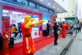Shenzhen, China: mobile phone stores opened, Sun Wukong and young women dancing to attract customers