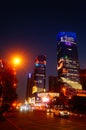 Shenzhen, China: night view of downtown bao `an, street and high-rise buildings and neon lights