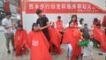 Shenzhen, China: party and group service stations offer free haircuts for citizens