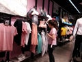 Shenzhen, China: people buy clothes or shoes at anta sports apparel store