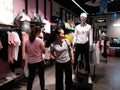 Shenzhen, China: people buy clothes or shoes at anta sports apparel store