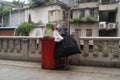 Shenzhen, China: picking up litter