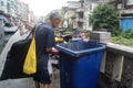 Shenzhen, China: picking up litter