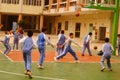 Shenzhen, China: pupils play basketball on the basketball court