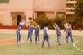 Shenzhen, China: pupils play basketball on the basketball court