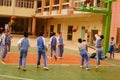 Shenzhen, China: pupils play basketball on the basketball court