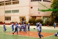 Shenzhen, China: pupils play basketball on the basketball court