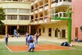 Shenzhen, China: pupils play basketball on the basketball court