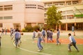 Shenzhen, China: pupils play basketball on the basketball court