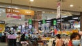 Shenzhen, China: shoppers check out at the cash desk of aeon supermarket